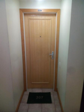 Um dormitorio de fundo 307